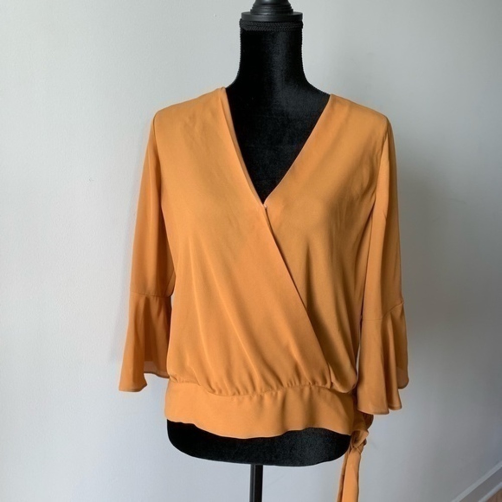 Mustard top with ruffle sleeves by A.Byer